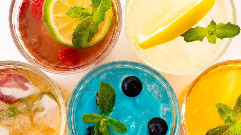 Summer fruity drinks from above with garnishes.