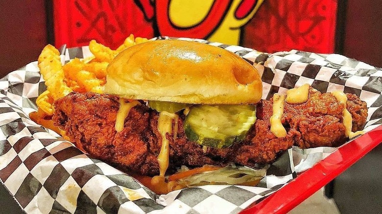 A chicken sandwich from Dave's Hot Chicken in a basket