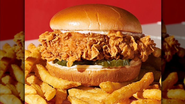 KFC crispy chicken sandwich with fries.