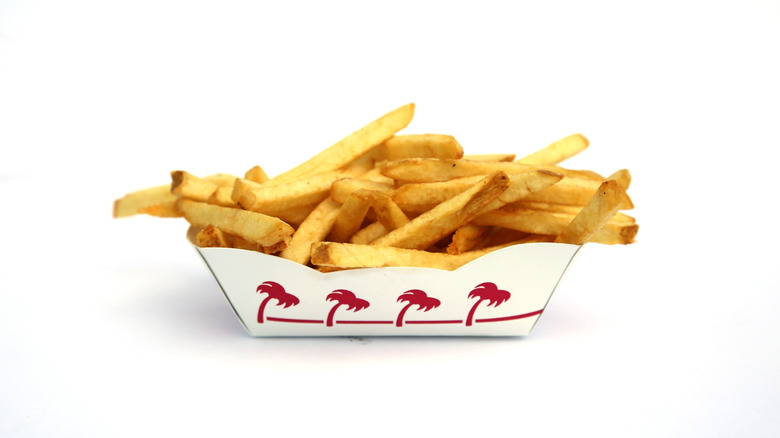 A single order of In-N-Out fries against a white backdrop