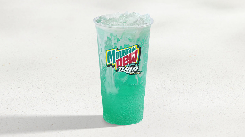 taco bell mountain dew baja blast dirty soda with white background