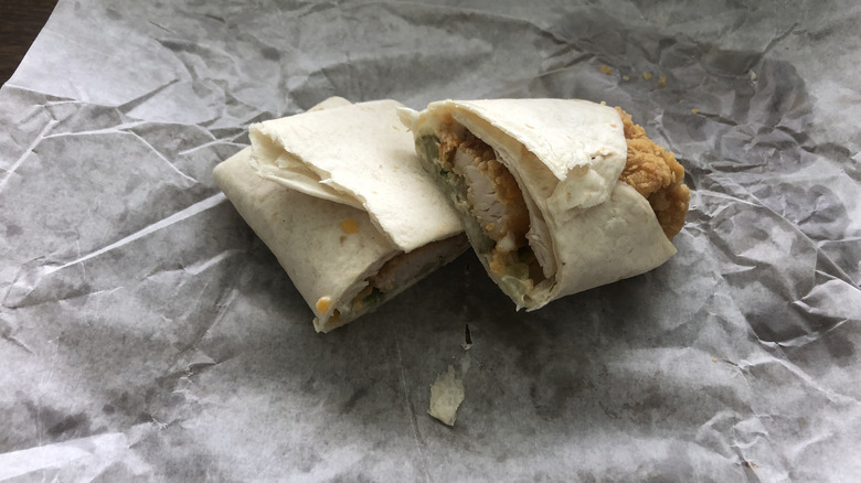 Popeyes classic chicken wrap on paper