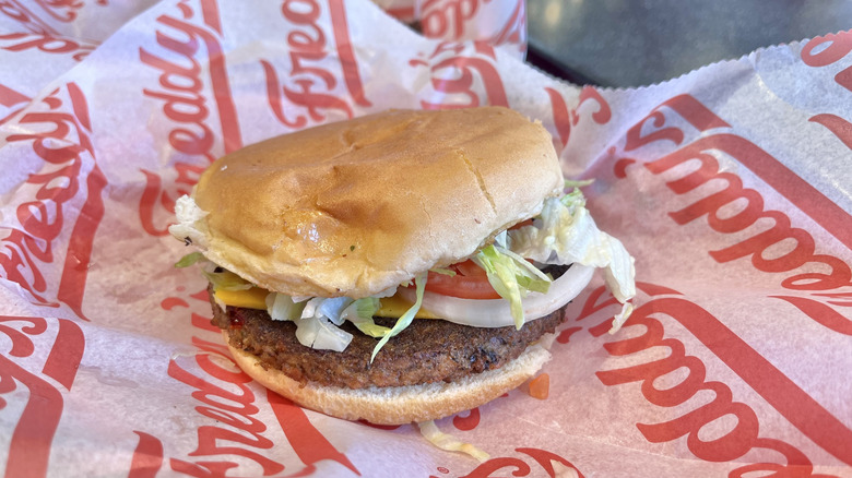 Veggie Burger with lettuce and tomato on a wrapper