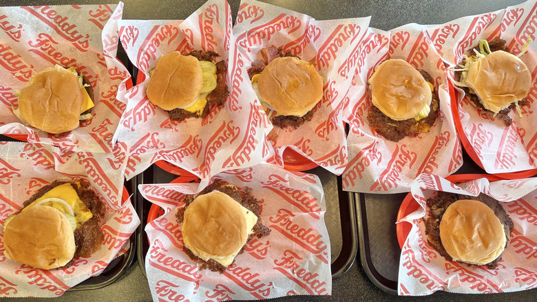 Top view of eight Freddy's burgers