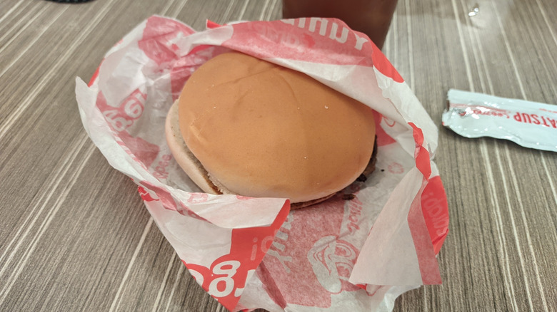 half unwrapped burger from Jollibee