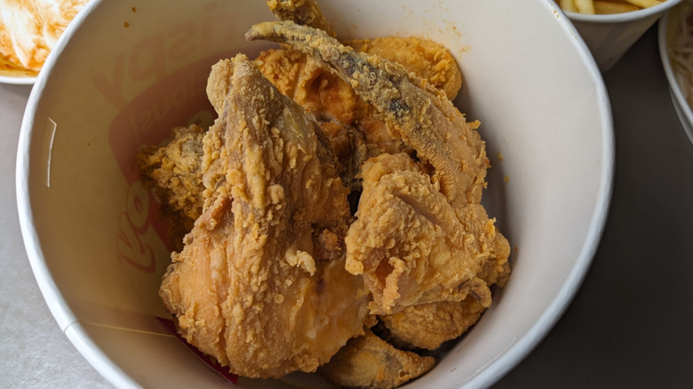 Bucket of fried chicken from Jollibee, top view