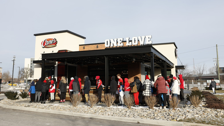 People crowded outside of Raising Cane's