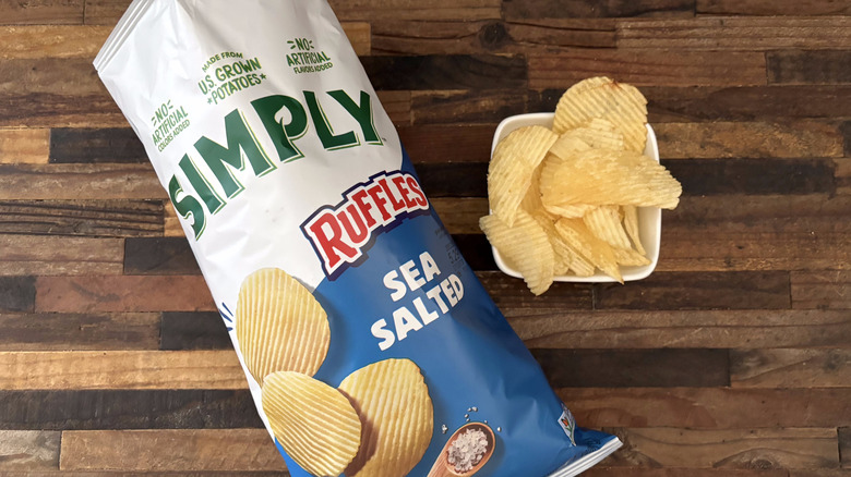 Simply Ruffles Sea Salt in bag and white bowl on wooden table