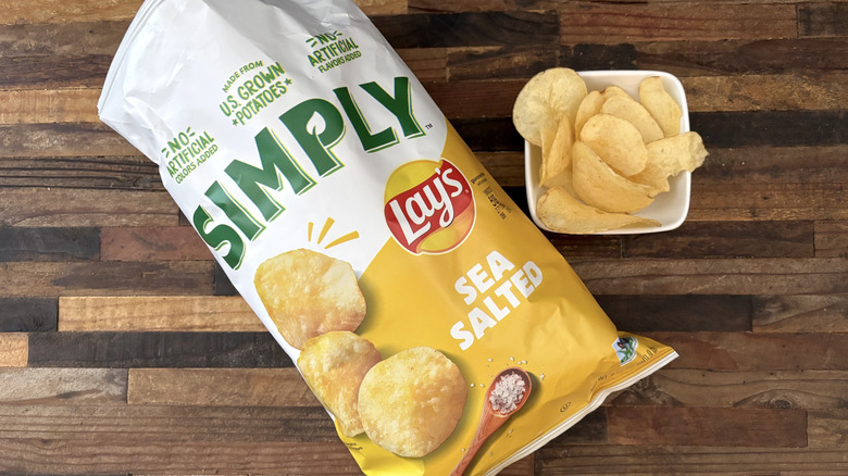 Simply Lay's Sea Salt in bag and white bowl on wooden table
