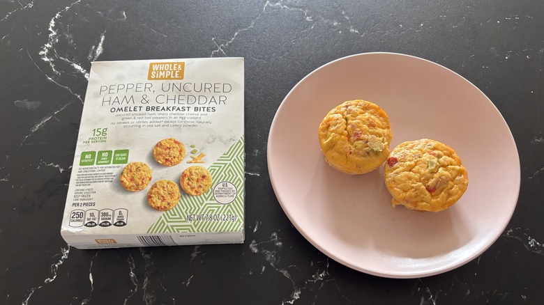 Aldi omelet bites box next to plate with omelet bites