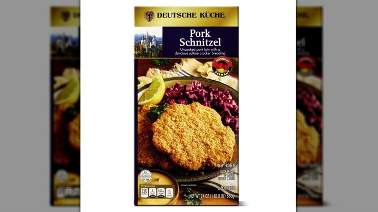 Deutsche Küche pork schnitzel on white background