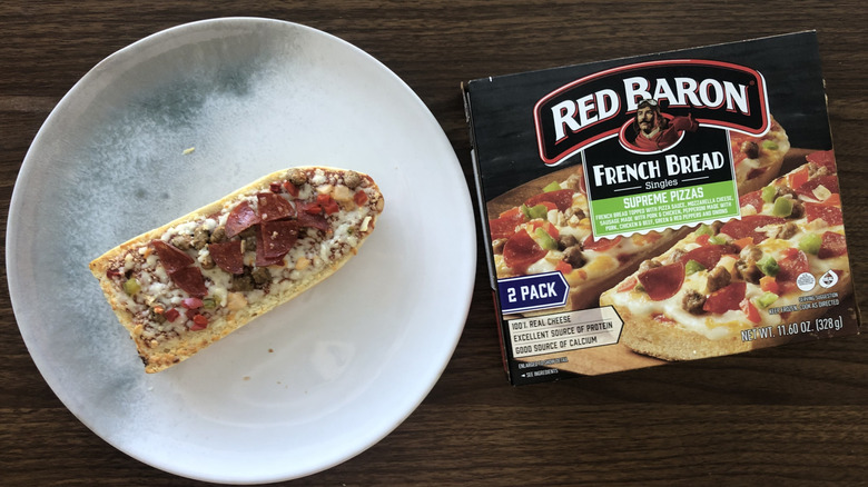 Red Baron French bread supreme pizza on a plate.