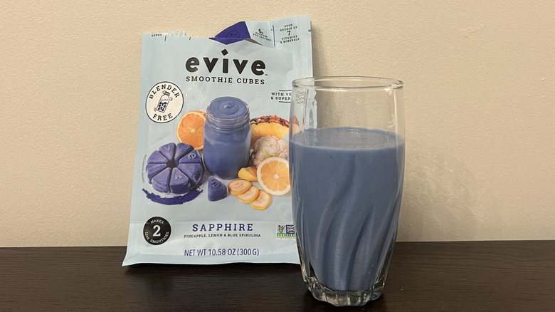 Evive Sapphire smoothie cubes smoothie in a glass.