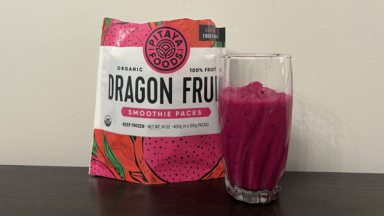 Pitaya Foods dragon fruit smoothie packs in glass.