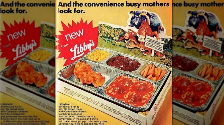 A children's TV dinner with spaghetti, chicken, and french fries