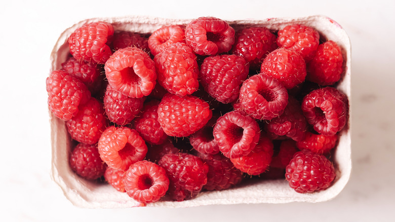 Punnet of fresh raspberries
