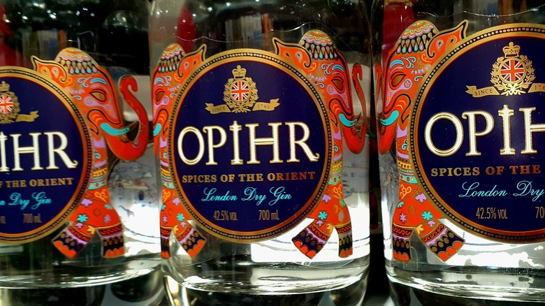 A close up of three bottles of Opihr, showcasing its oriental presentation