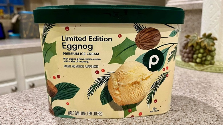 Half gallon tub of eggnog ice cream on kitchen counter