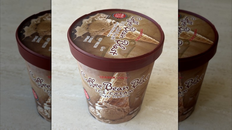 Quarter of ice cream on table with illustration of upside down ice cream cone on packaging