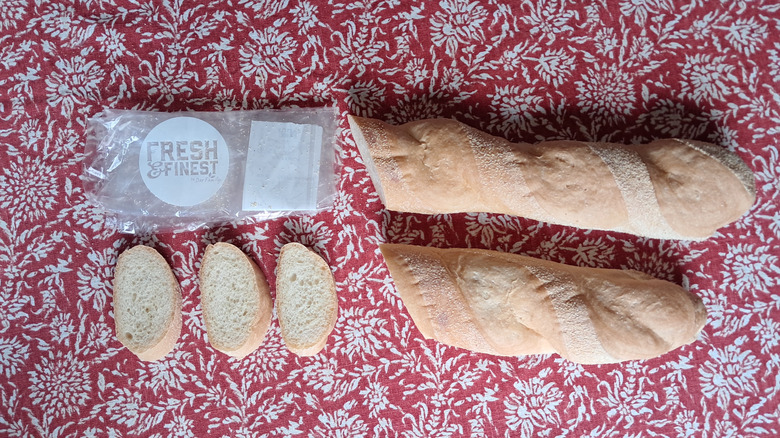 Cut baguette on table cloth