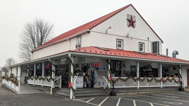 View of Bird-in-Hand Bake Shop's wraparound porch from the parking lot