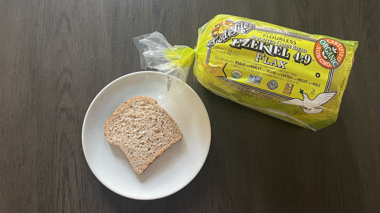 Slice of Food for Life Ezekiel 4:9 bread on a plate.