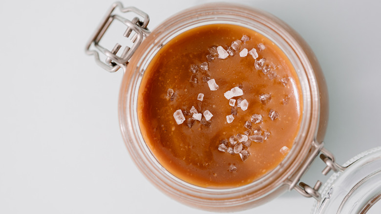 Salted caramel in glass jar from above