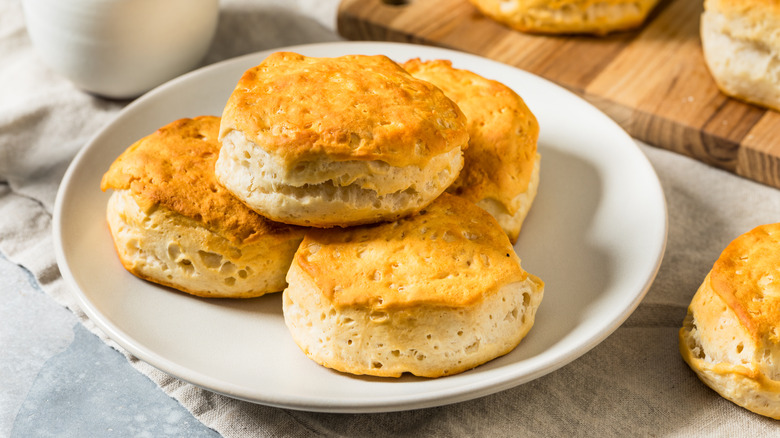Biscuits stacked on white plate