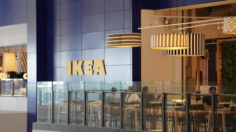 An outside shot of an IKEA seating area with a few diners enjoying their meals