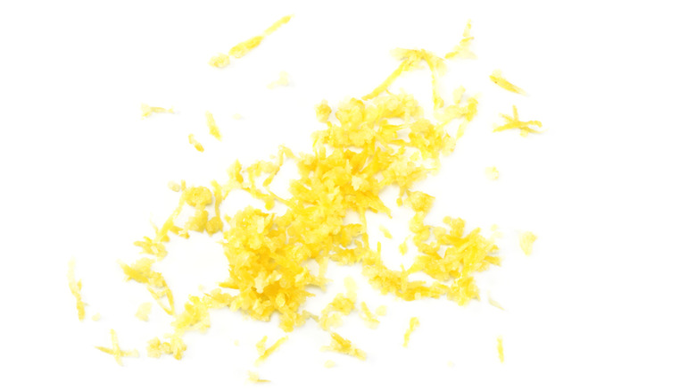 Lemon zest on white background