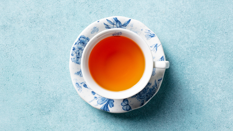 A cup of tea on blue countertop