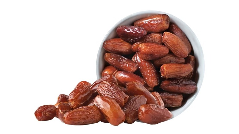 medjool dates on white background