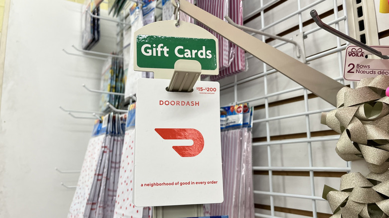 Doordash gift card hanging on hook at Dollar Tree