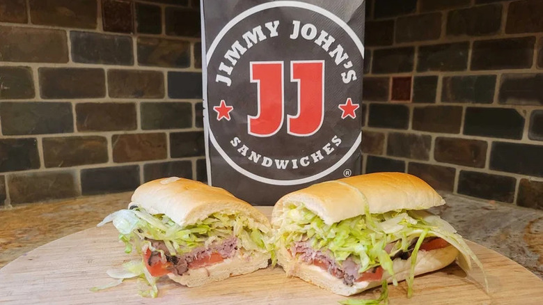 Big John from Jimmy John's in front of bag