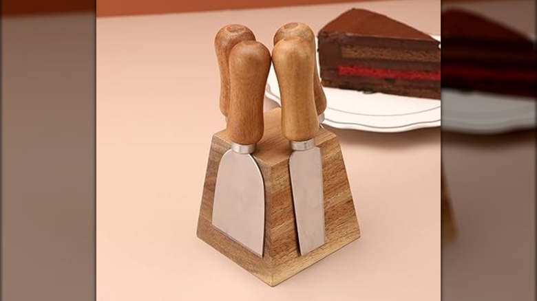 An Olelo cheese knife set on a countertop