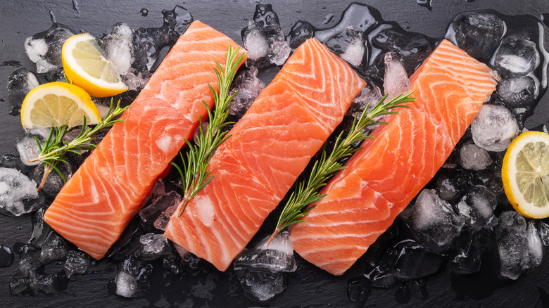 center cut raw salmon fillets on board
