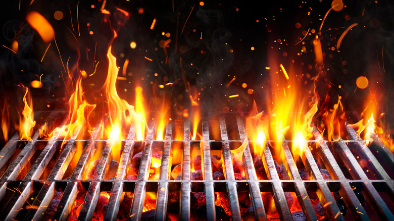flames shooting through grill grates