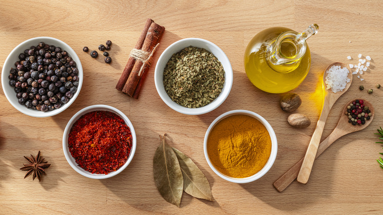 Bowls filled with different herbs and spices