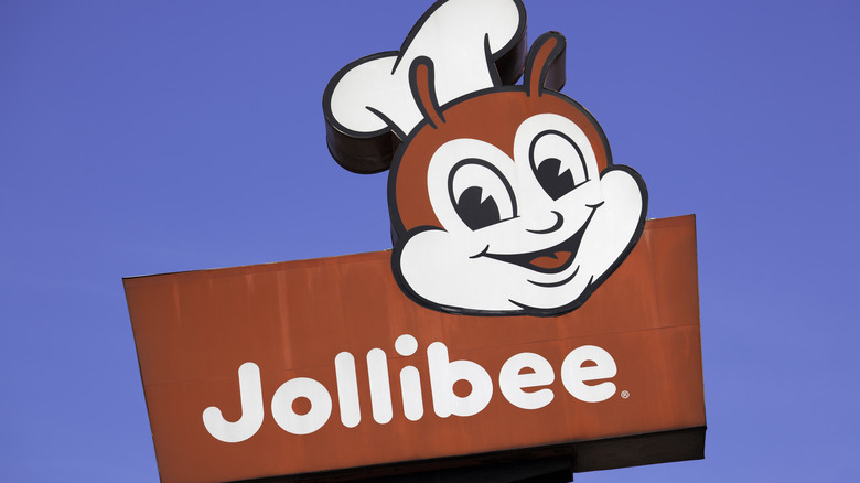 Jollibee sign on blue sky background