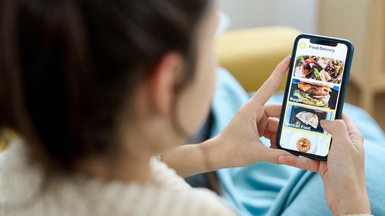 Person ordering food on a restaurant app