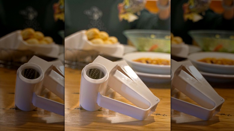 Olive Garden cheese grater on wooden table