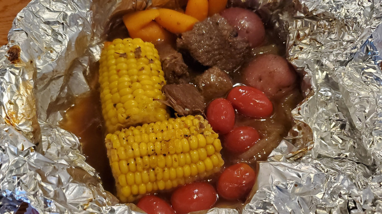 Stewed meat, tomatoes, and corn in foil from Cracker Barrel's summer campfire menu