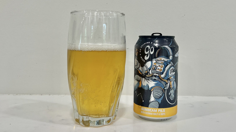 Go Brewing Sunbeam Pils poured out into a glass.