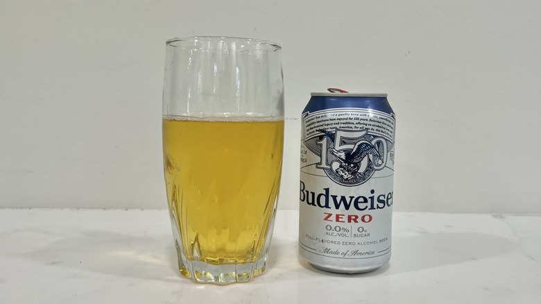 Budweiser Zero poured into a glass.