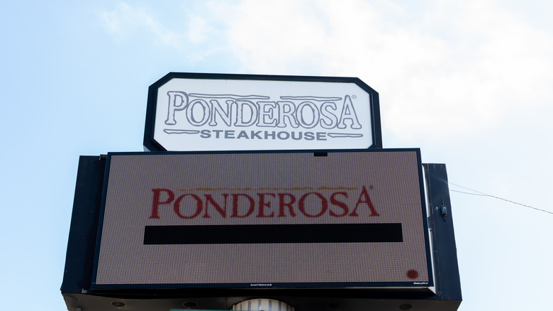 Ponderosa Steakhouse sign against blue sky