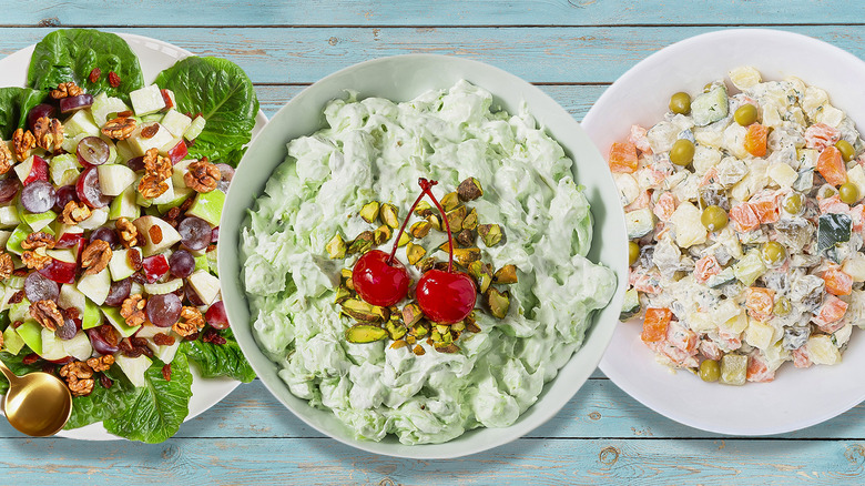 three vintage salads in white bowls