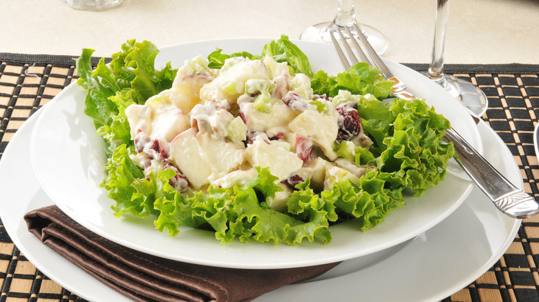 waldorf salad on bed of lettuce