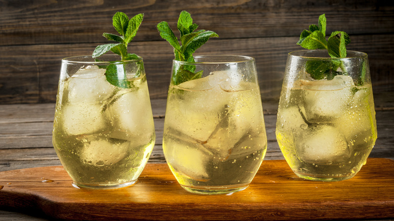 three rebujito cocktails on a wooden table