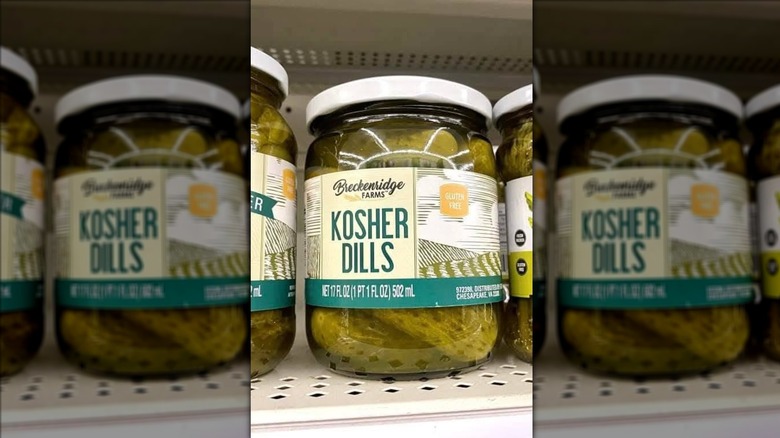 Jar of kosher dill pickles from Dollar Tree on store shelf