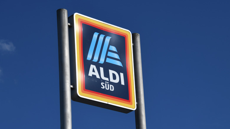 Aldi sign against blue sky